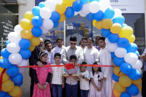 Maqased staff assisting client with business license